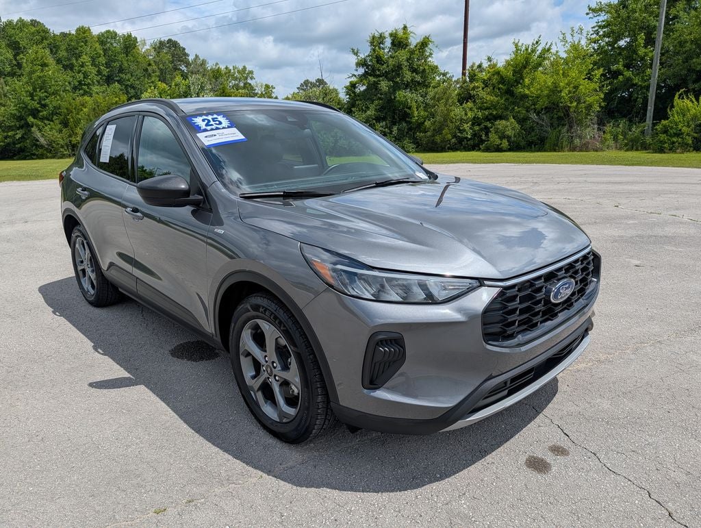 2025 Ford Escape ST-Line in Carbonized Gray Metallic — front three-quarter view
