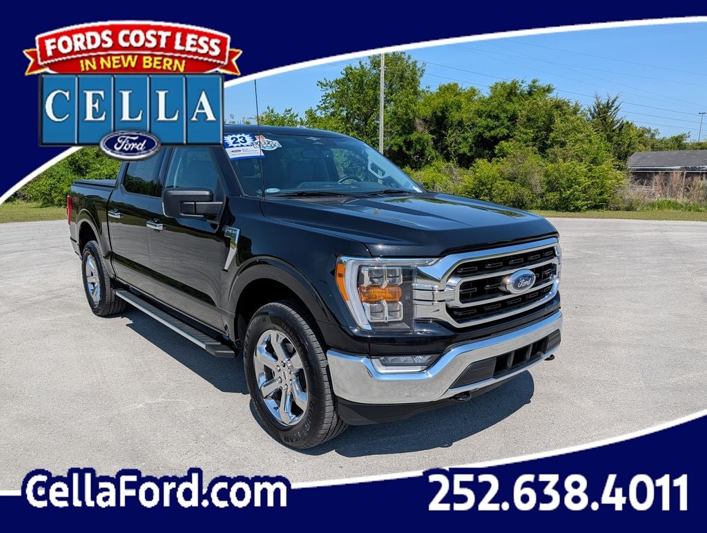 2023 Ford F-150 XLT in Black Metallic — front three-quarter view