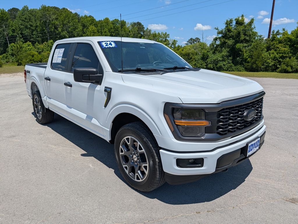 2024 Ford F-150 STX in Oxford White — front three-quarter view