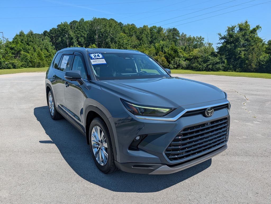 2024 Toyota Grand Highlander Platinum in Storm Cloud — front three-quarter view