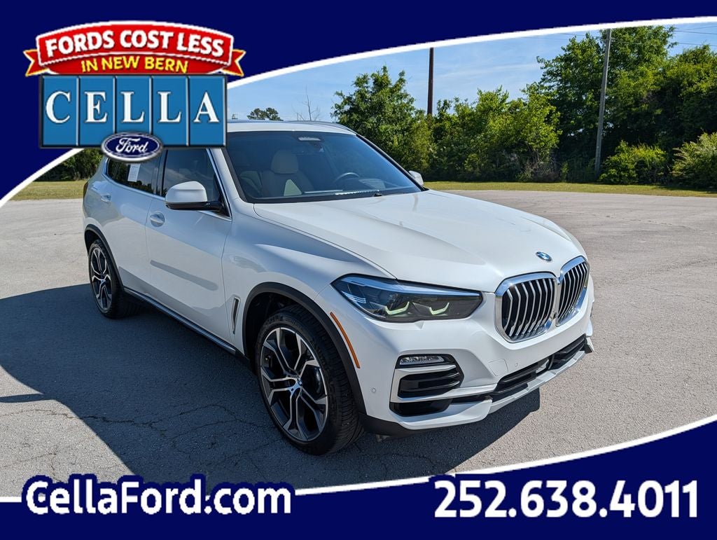 2021 BMW X5 xDrive40i in Mineral White Metallic — front three-quarter view